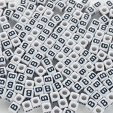 BD00113-02-black-letter-white-opaque-cube-alphabet-beads-single-b-7mm